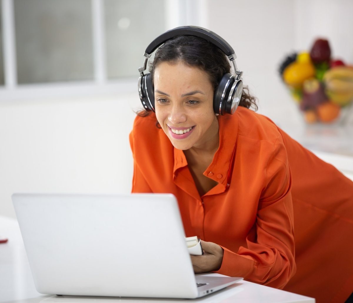 African American woman person using laptop computer to working in business at home